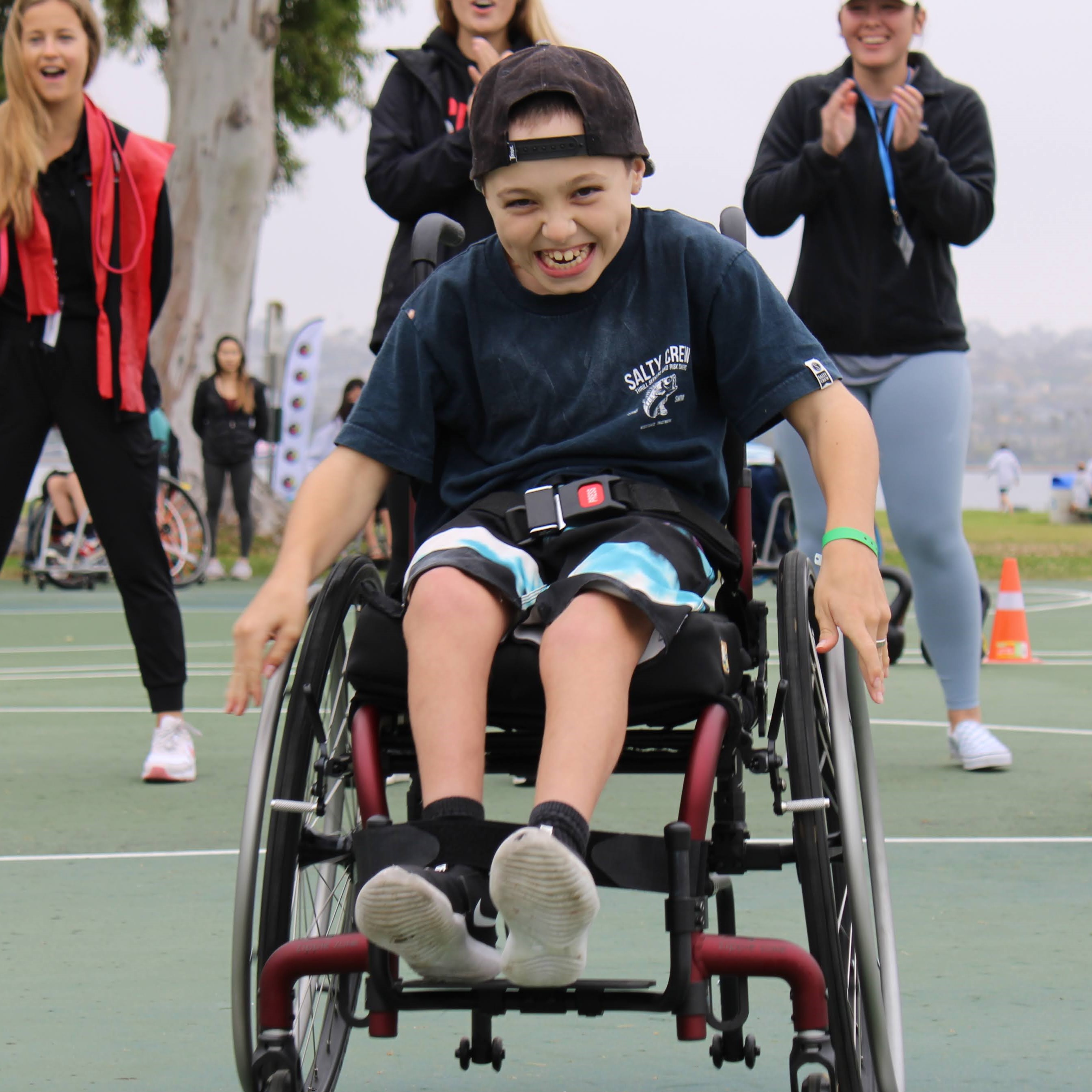 Kid using their wheelchair