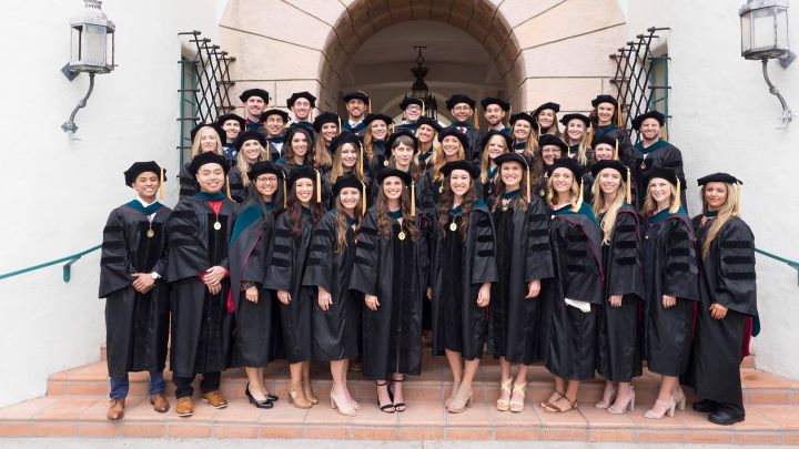 4th Cohort group photo on the stairs of Hepner Hall