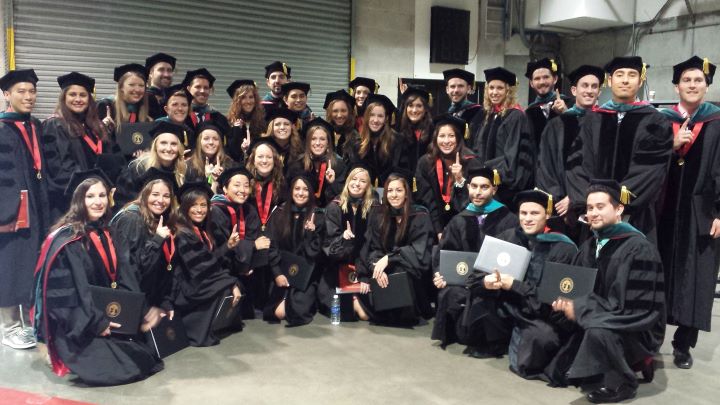 First DPT Graduates in their Caps and gowns