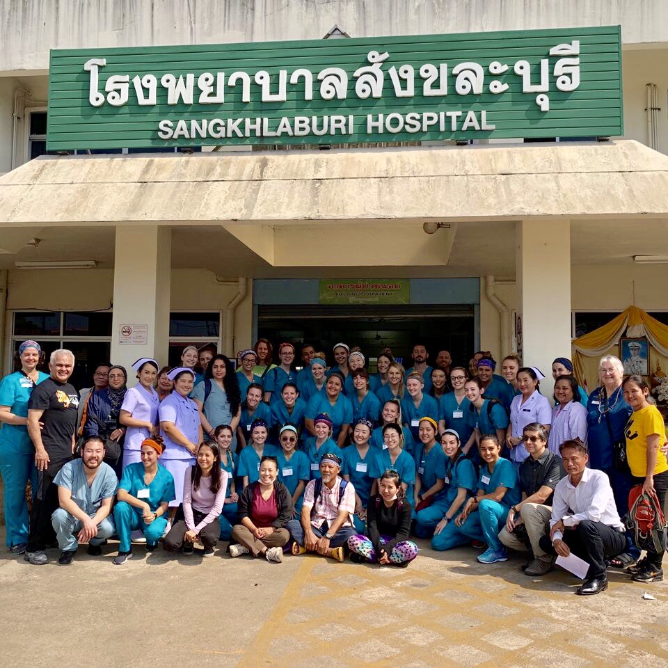 Group Photo in front of Thai Hospital